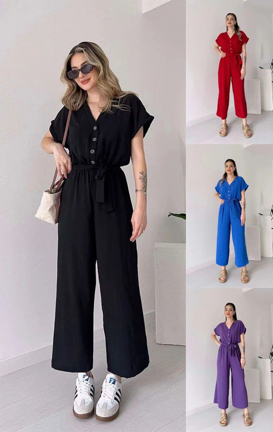 "Sleeveless V-neck red jumpsuit with a belt"
